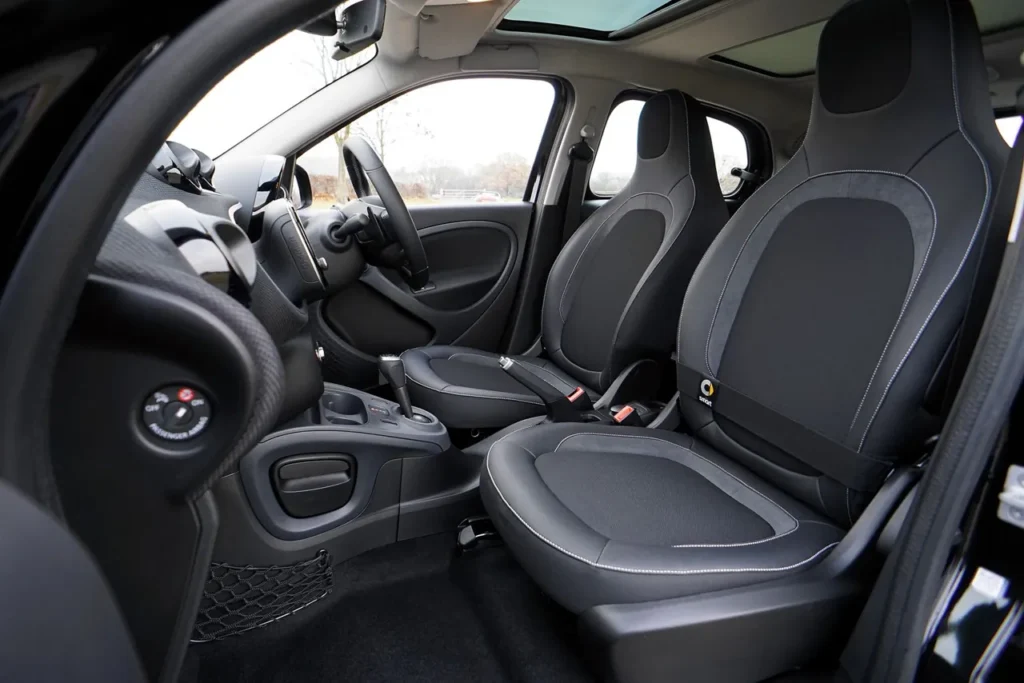 Can You Feng Shui an Engine? Applying Feng Shui Ideas to Your Car Clean, uncluttered car interior with front seats and dashboard