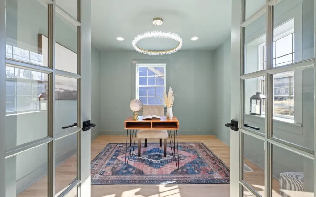 Home office desk placed to face the doorway