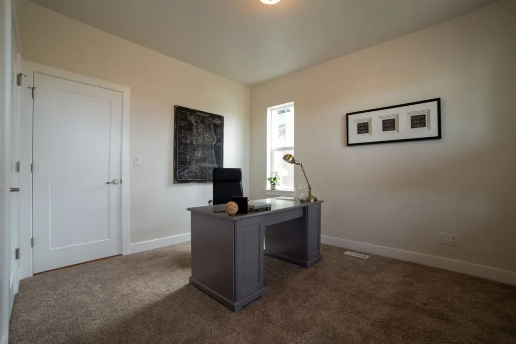 Home office with the desk set to face into the room