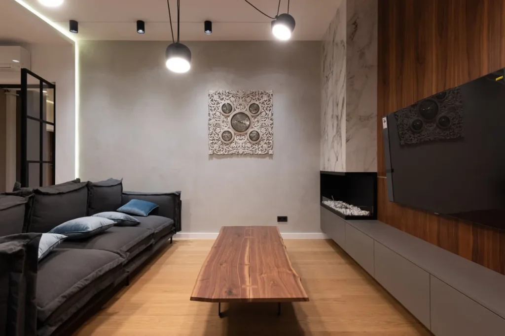Living room with a wooden wall and wooden coffee table